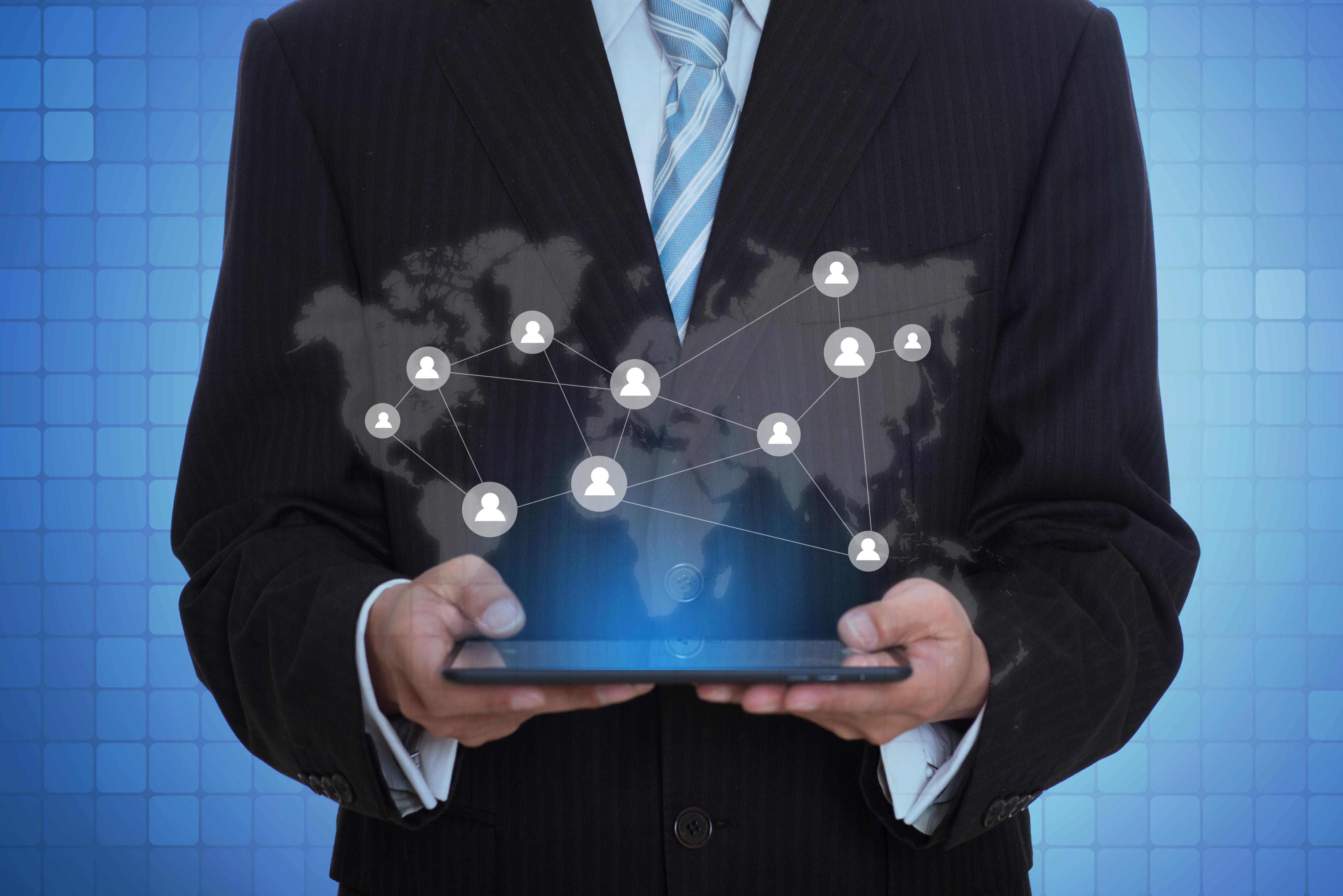 Business professional using a tablet to access digital government applications